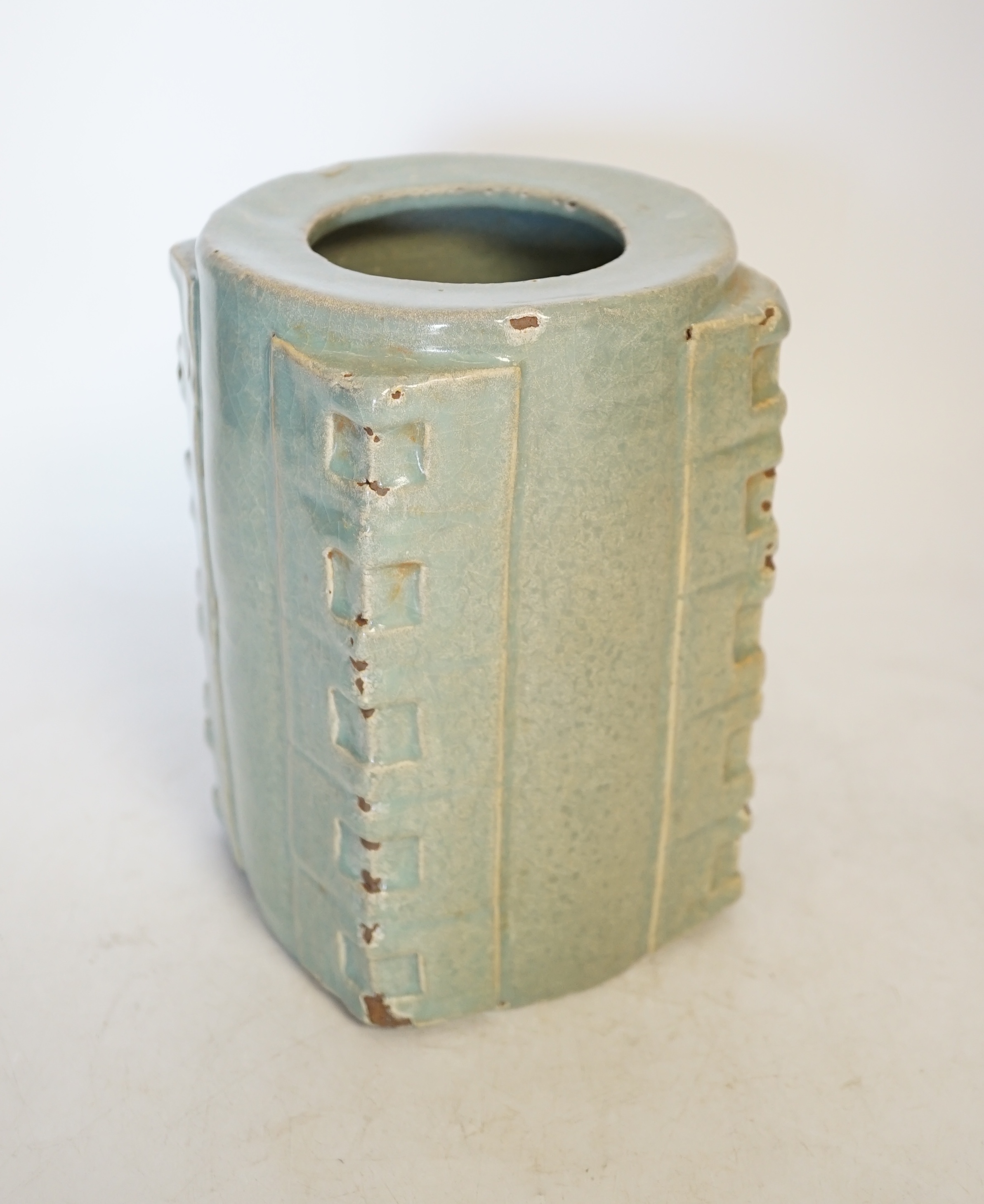 A Chinese celadon glazed cong jar, 18cm high. Condition - poor to fair, some chipping